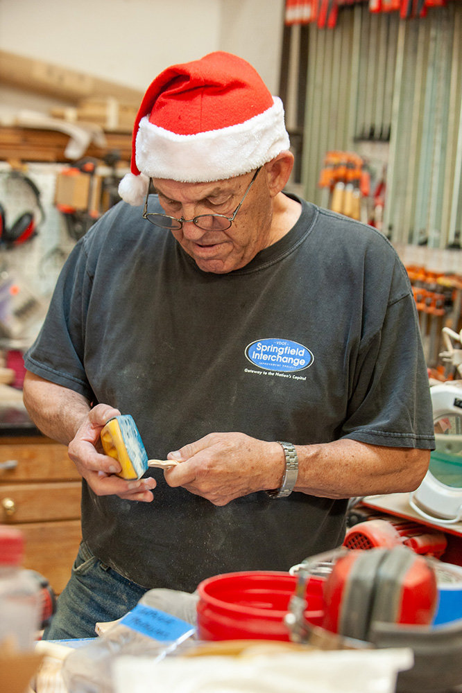 Annapolis Woodworkers Guild President Ken Davis worked on small toy pieces.