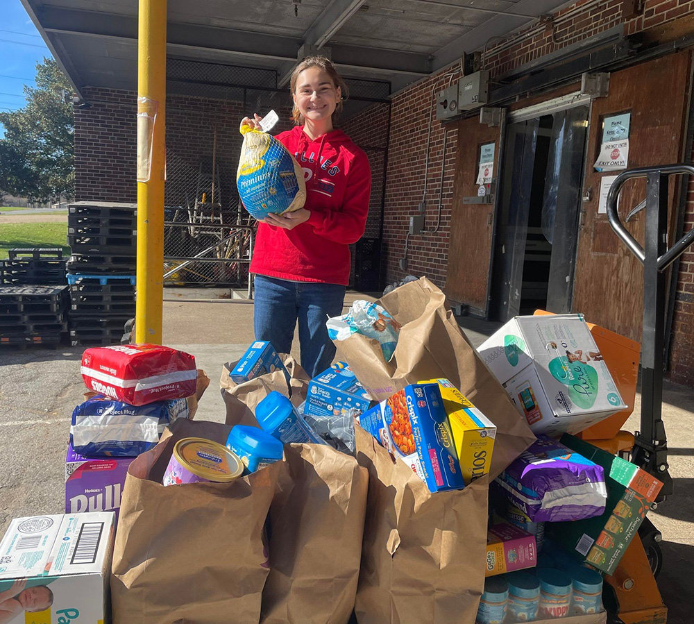 A student held a fall food drive for the Anne Arundel County Food Bank, collecting 504 pounds of food and 20 pounds of diapers from her friends and family.