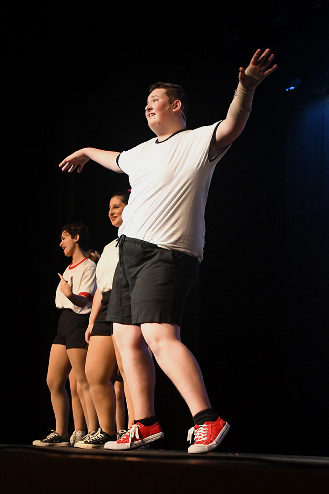 Joseph Schroeder, playing Ren McCormack, tried to persuade his classmates into dancing.