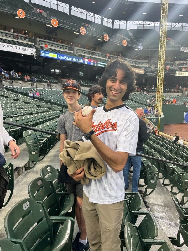 Kawsar Nakhtar, an Afghan refugee currently living in Catonsville, caught a ball at a Baltimore Orioles game this past baseball season.