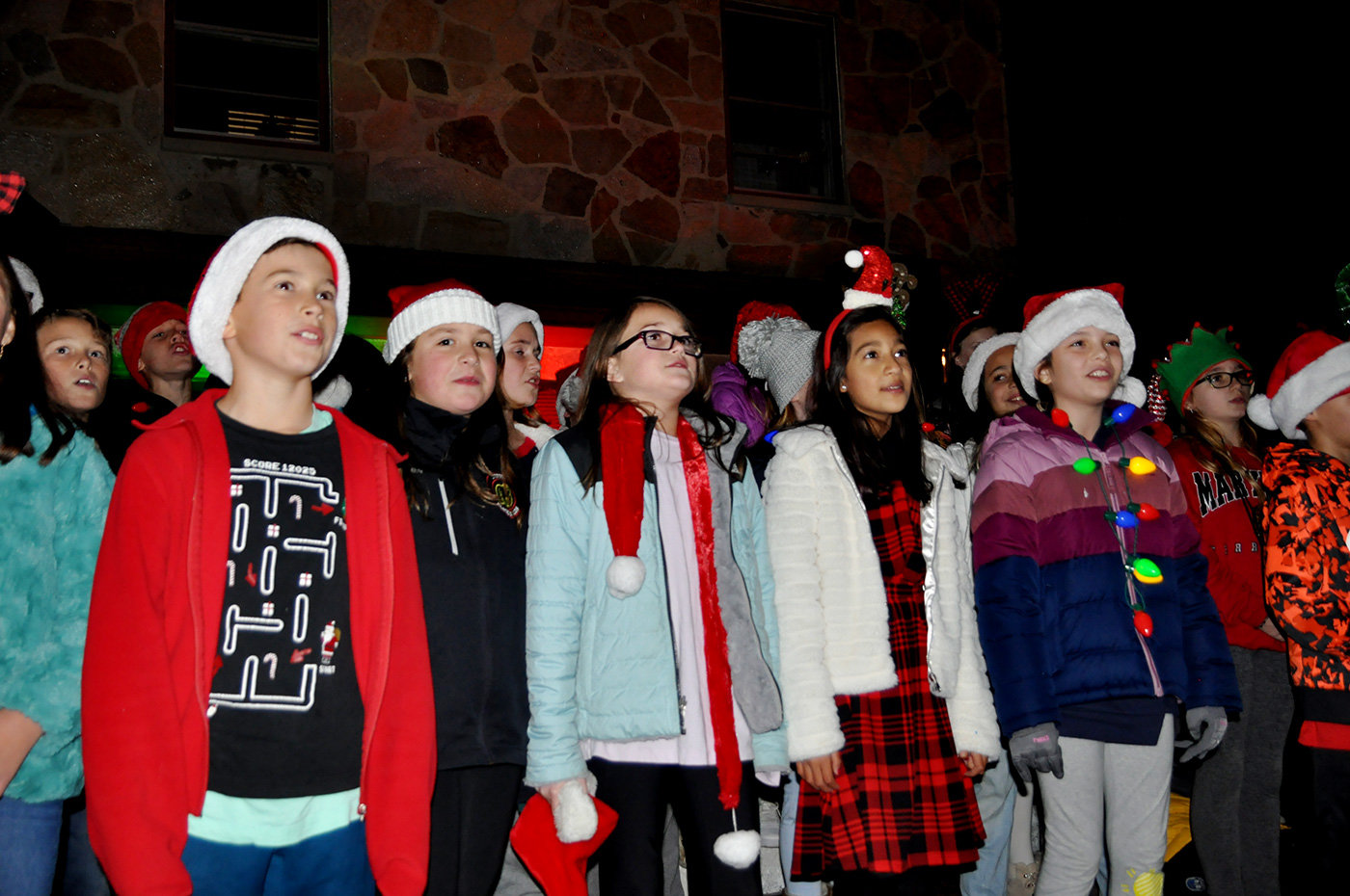 Severna Park Elementary School’s fifth-grade chorus sang three Christmas tunes for the crowd on December 2.