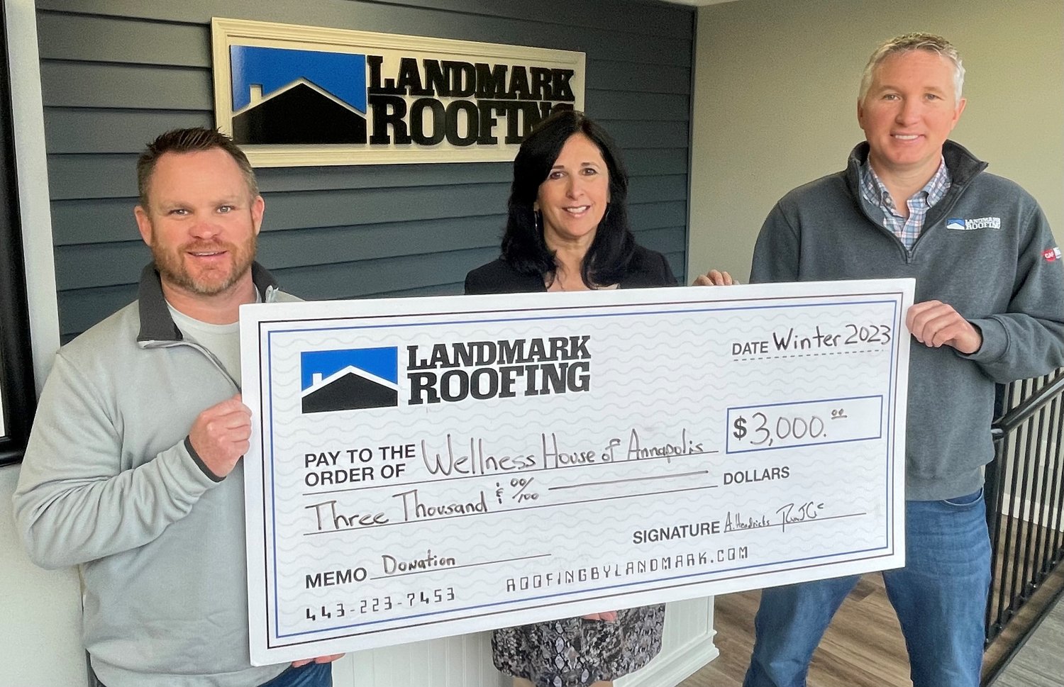 (L-R) Rob Calhan, Landmark president of sales; Mary Jermann, executive director of Wellness House of Annapolis; and Artie Hendricks, Landmark president of operations, gathered for a check presentation.