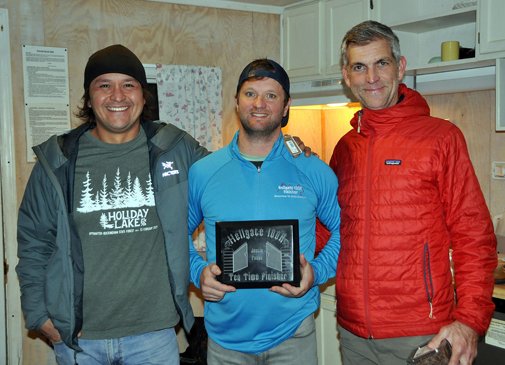 Justin Peake smiled with his crew and friends Carter Swamp (left) and Stacin Martin after finishing the Hellgate 100K last month.