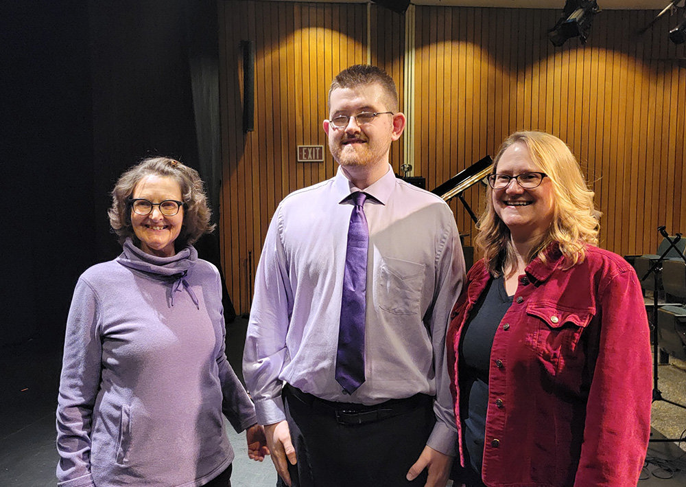 Carolyn Sonnen (left) and Diane Kingsley are two of Tyler Shallue's biggest supporters and helped him prepare for his Braille music recital at Anne Arundel Community College last month.