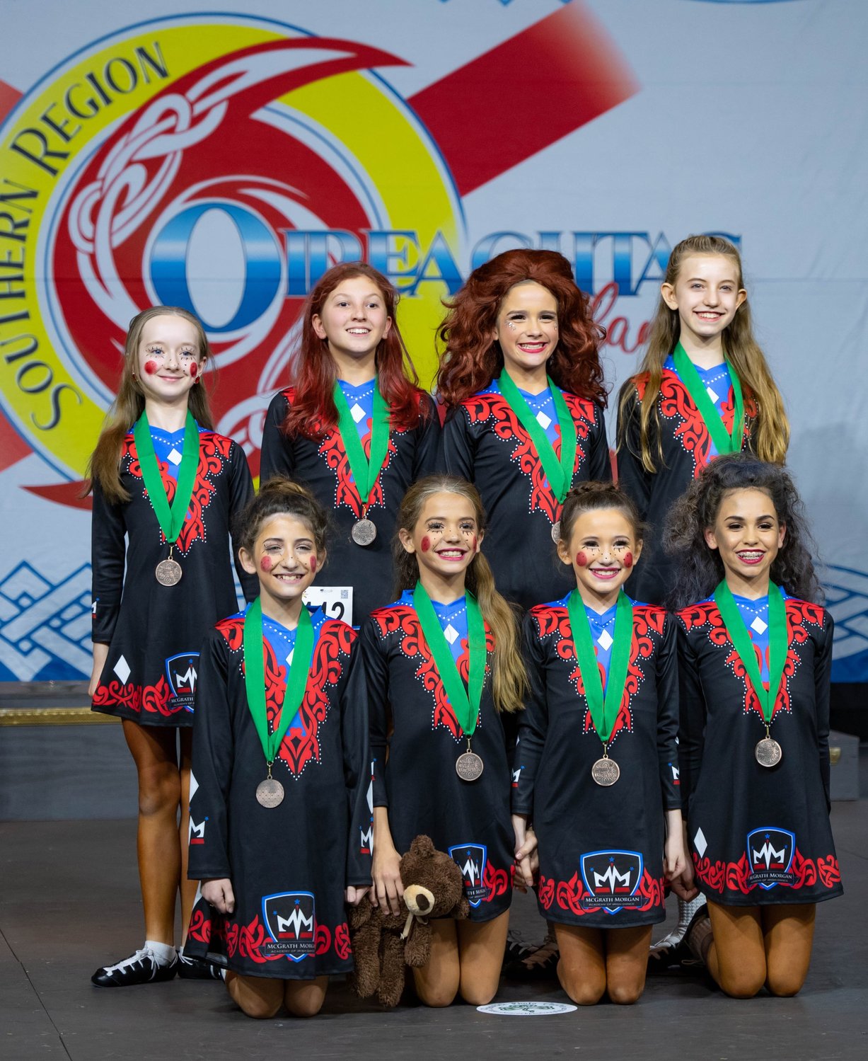 Isabella “Izzy” Renzi (bottom right) was one of several McGrath Morgan Academy of Irish Dance members who excelled during the Irish Dance Teachers Association of North America (IDTANA) Southern Region Oireachtas in Orlando this December.