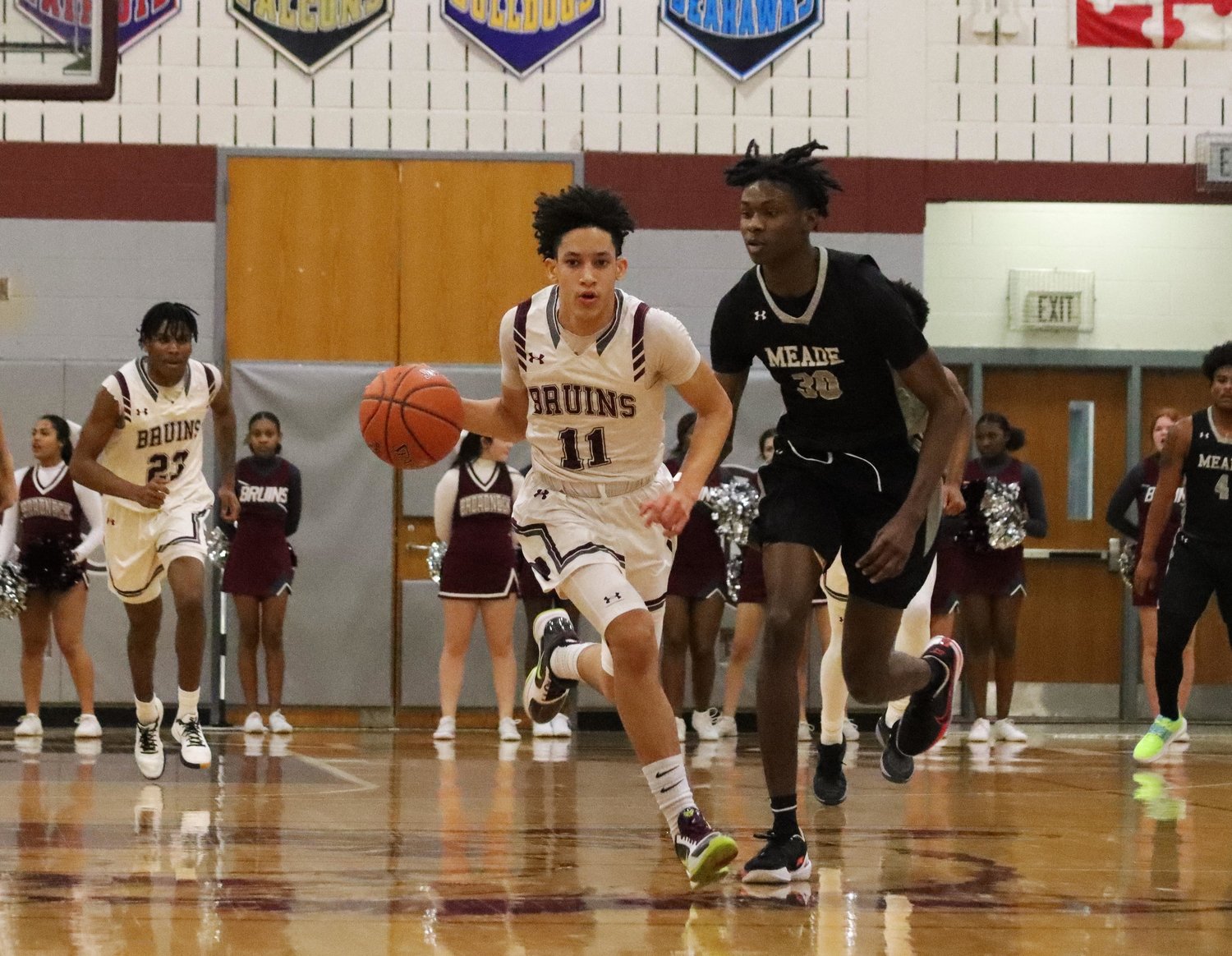 Jordan Brown dribbled upcourt. The guard has played at a high level for Broadneck all season.