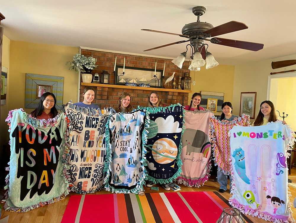 Severna Park High School students showed off their blanket creations for Project Linus.