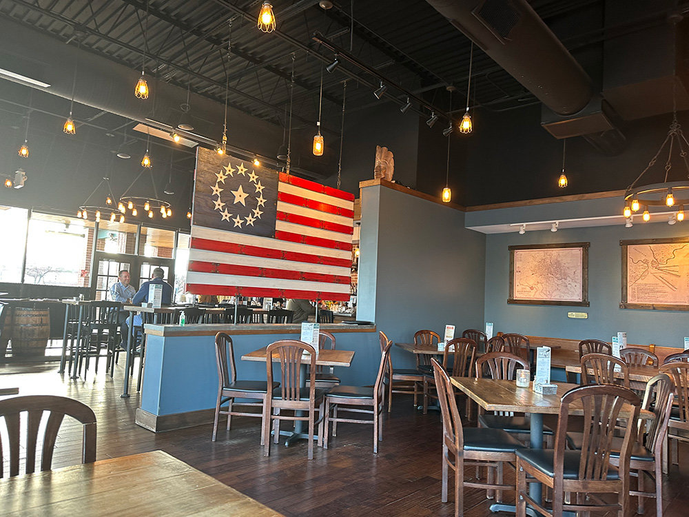 Founders has an old-timey feel, with wood floors, exposed beams, a U.S. Cowpens flag, copies of ancient maps and more.