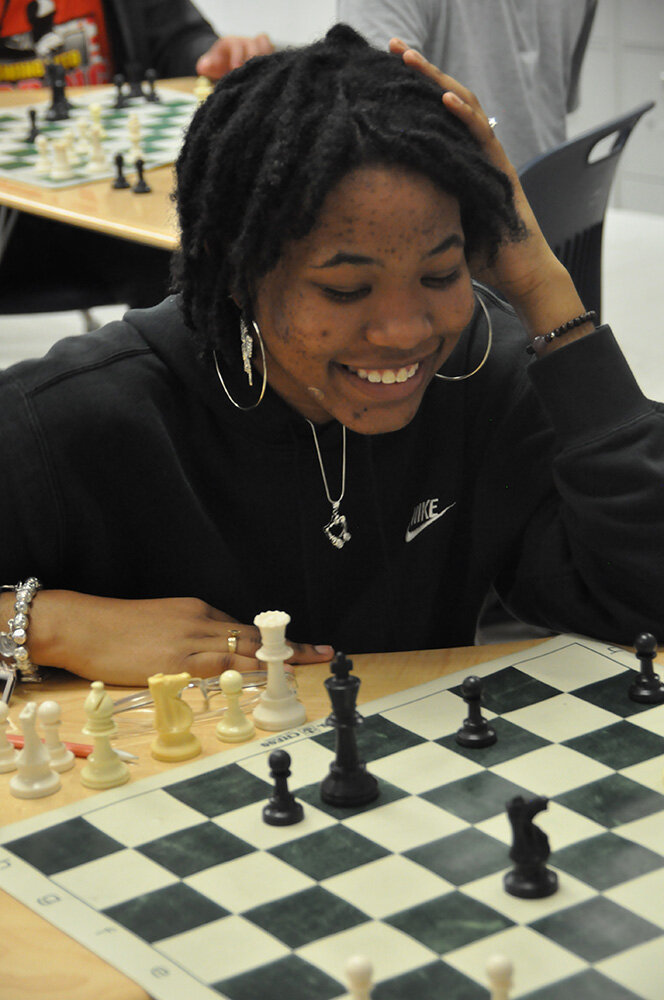 Severna Park High School freshman Kimora Turner played chess during a Chess Club meeting at the school April 20.