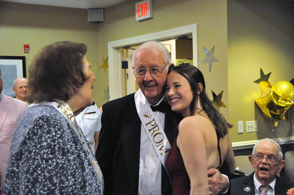 Don and Yvonne Taylor shared a laugh with Emme Ray, Brightview Severna Park vibrant living assistant and planner of the senior prom.