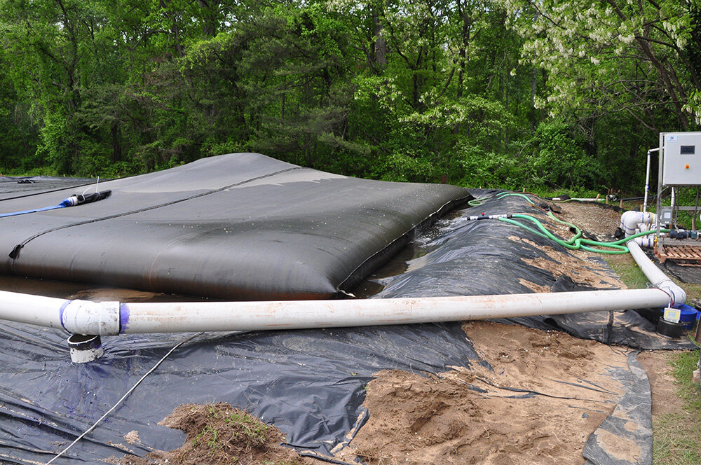CSI Environmental utilized three-dimensional geotextile and advanced polymer systems, where a dredge sucked sediments out of Cool Pond, from where the sediments were pumped uphill into geotextile tubes.