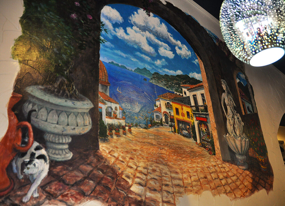 Murals depicting scenes typical of the southern Italian coast adorn the walls at Luna Blu in Annapolis.