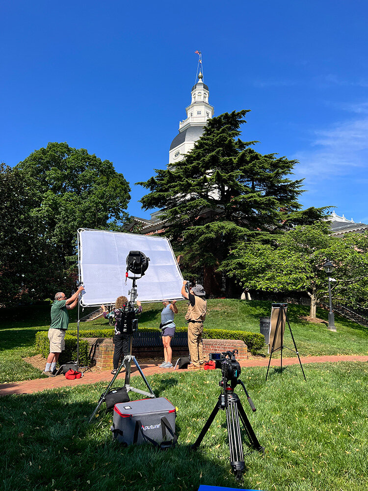 The filmmaking team used wide shots to capture the State House in the background.