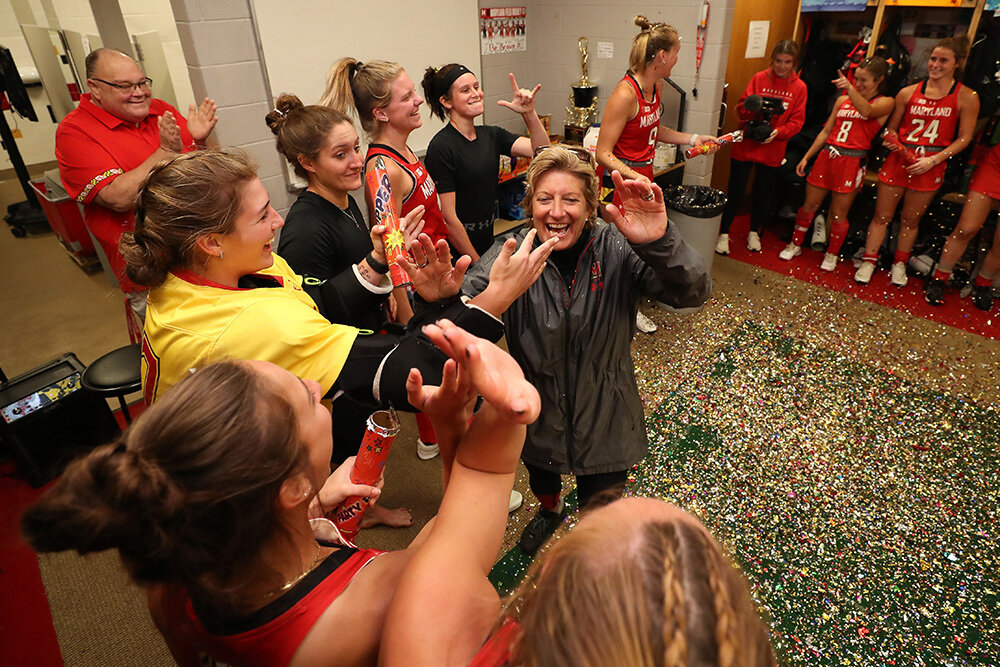 Missy Meharg and her team celebrated after her No. 8 ranked squad beat No. 17 University of Connecticut, 3-2, in October 2021, the 600th win of Meharg’s coaching career.