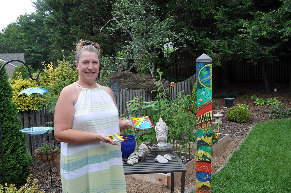 Susi Cooper showed off some of her workshop glass creations in the backyard of her Arnold home. Cooper participated in both the July and August offerings.