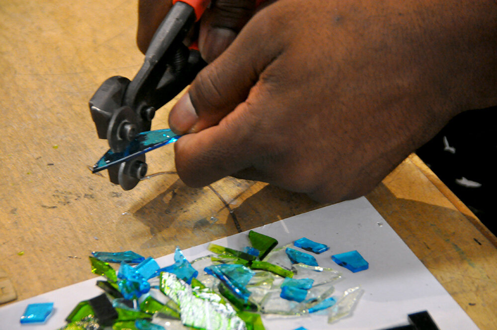 The sound of cutting glass filled the air of a workshop at Annapolis’ Maryland Hall. This workshop aimed to provide artistic opportunities with glass to veterans.