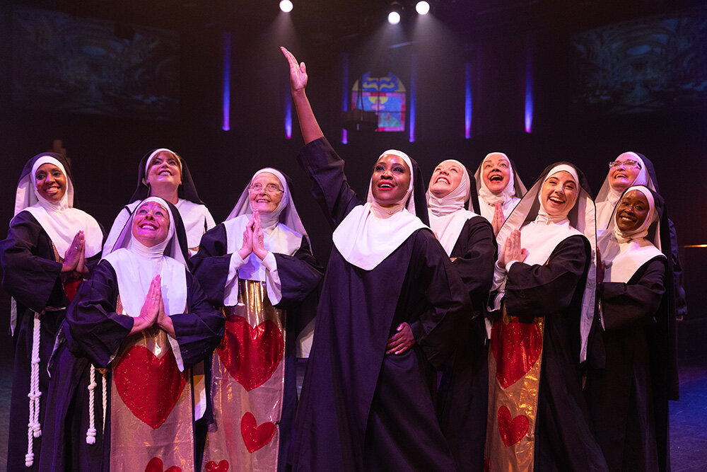 Ashley Johnson-Moore stars as Deloris, pictured here with the Queen of Angels sisters, in “Sister Act.”