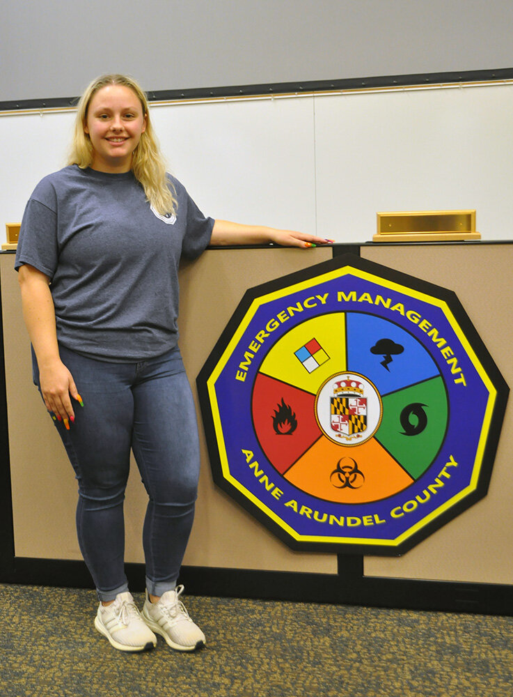 Kasey Thomas, public information officer for the Anne Arundel County Office of Emergency Management (OEM) and coordinator of the Joint Information Center, part of the county’s Emergency Operations Center, posed at the emergency center.