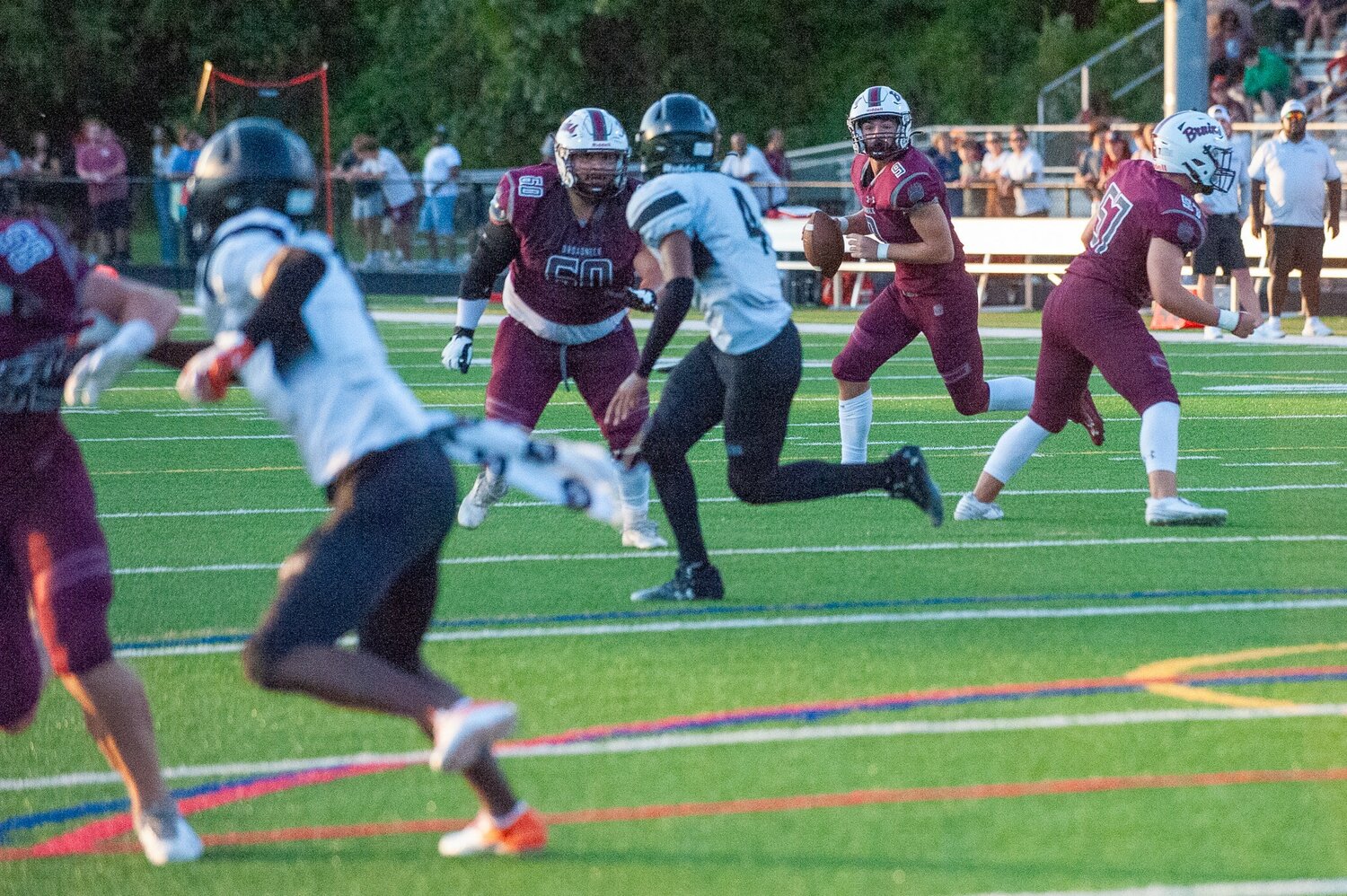 Broadneck quarterback Nate Tapley (9) scanned the field for an open receiver.