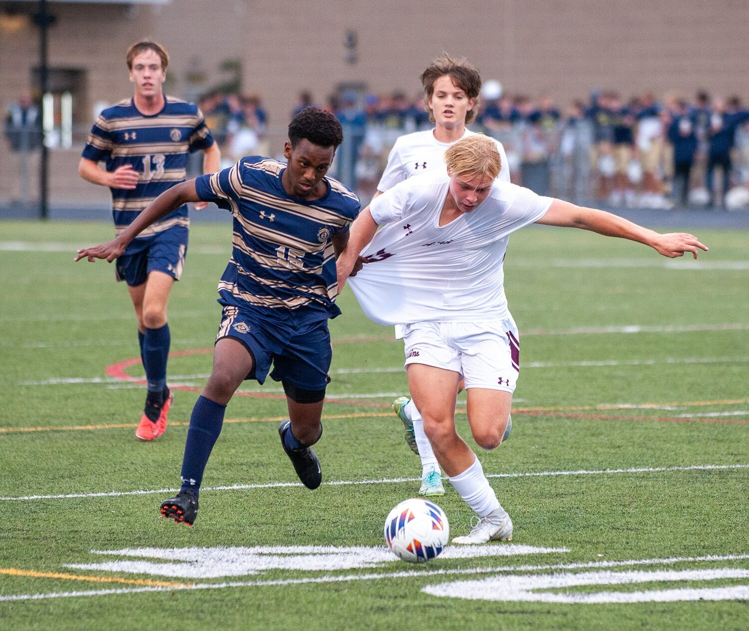 Severna Park’s Eneko Allen and Broadneck’s Tanner Boone fought for possession during Tuesday’s game.