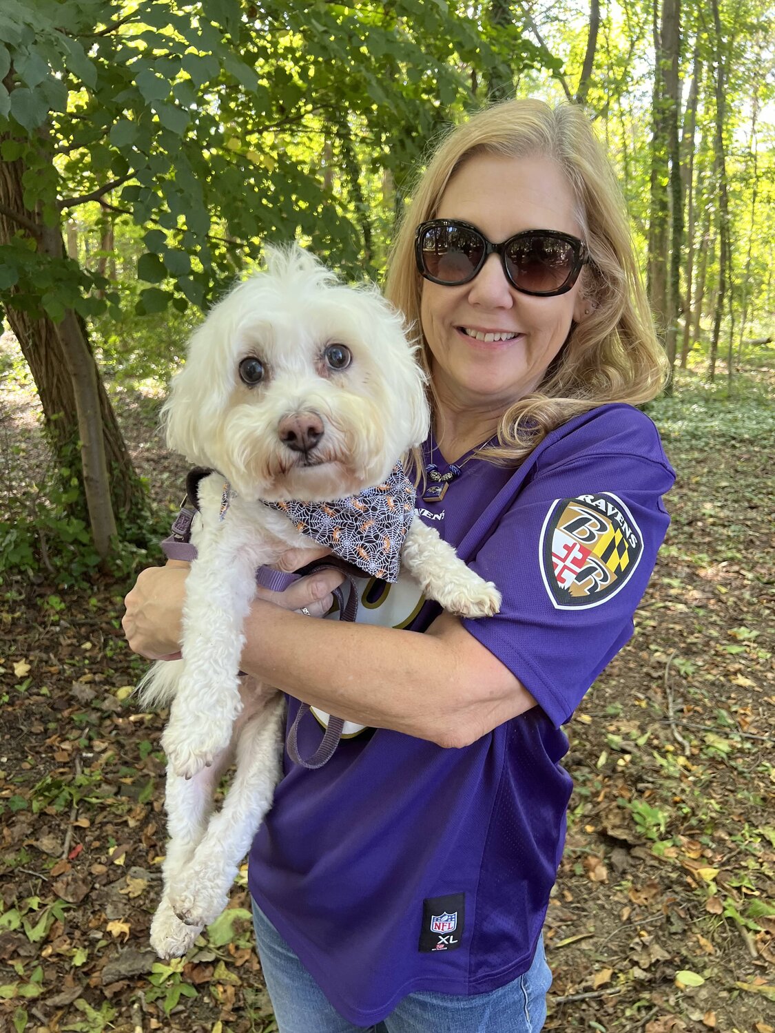 This Ravens fan and her puppy received the blessing and then hurried home to catch the end of the Ravens game, in which the hometown team defeated the Browns 28-3.