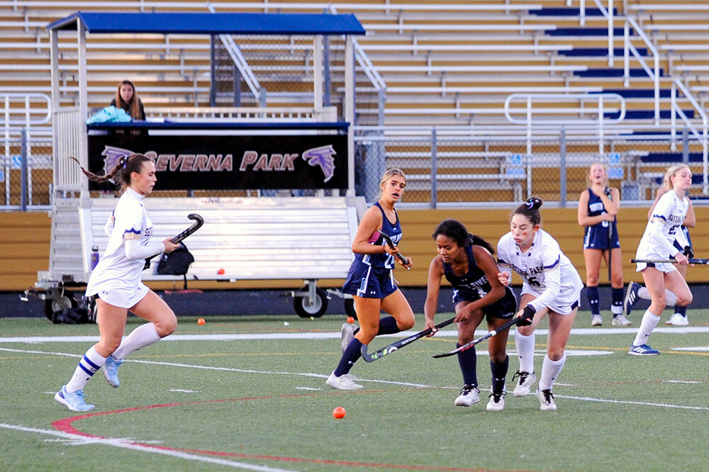 Severna Park’s Emerson Clarke, right, contested for the ball.