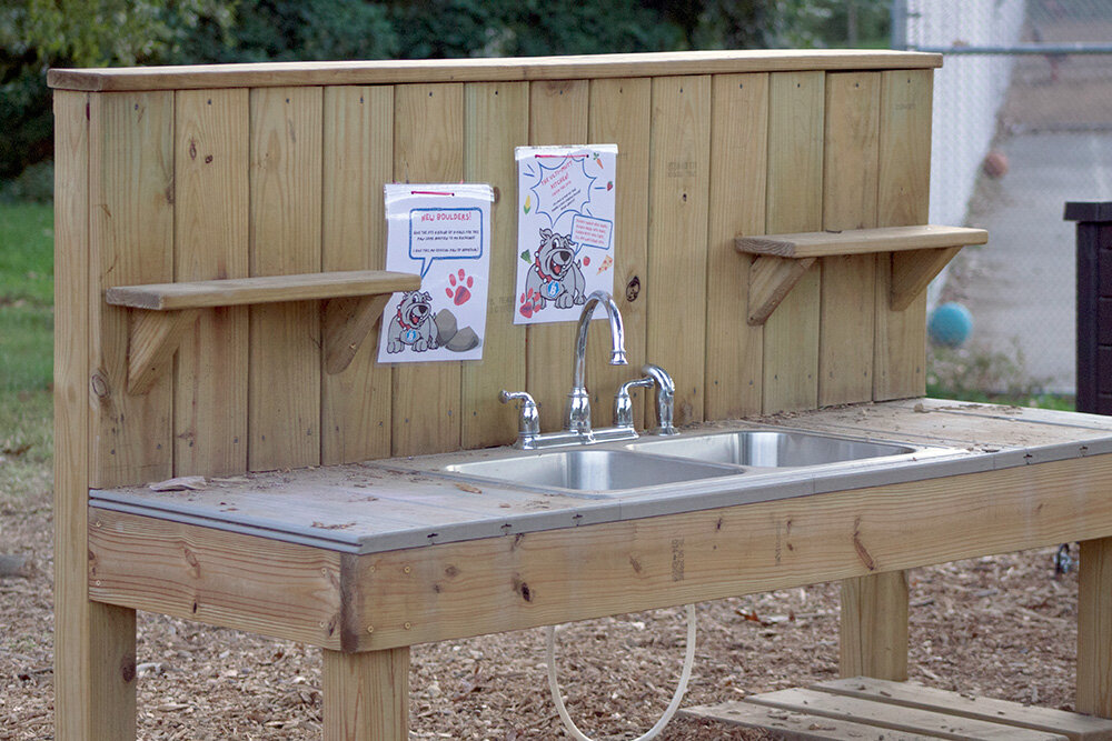 An outdoor kitchen is now part of the play space.