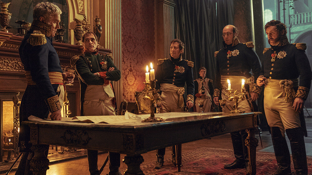 Caulaincourt (Ben Miles), Napoleon (Joaquin Phoenix), Marshal Berthier (Scott Handy), Marshal Davout (Youssef Kerkour) and Marshal Ney (John Hollingworth) planned for battle in the Apple film “Napoleon,” released theatrically by Columbia Pictures.