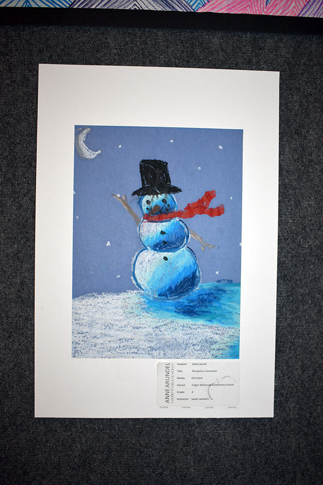 Stella Jarrell, a fourth-grader at Folger McKinsey Elementary School, created this snowman with oil pastel.