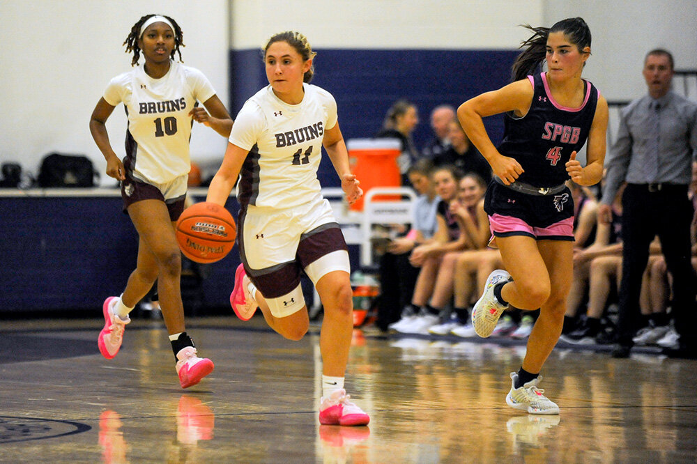 Broadneck’s Ginger Kerdock (11) brought the ball upcourt against Severna Park in December. Kerdock hit two key shots late to help her team grind out a 46-38 win.