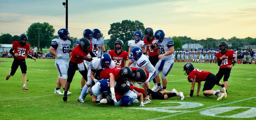 Pile up at Joe Price Stadium! Pictured, Stockton Tigers are hungry for the ball on Friday, Aug. 26, in their matchup against Marionville.