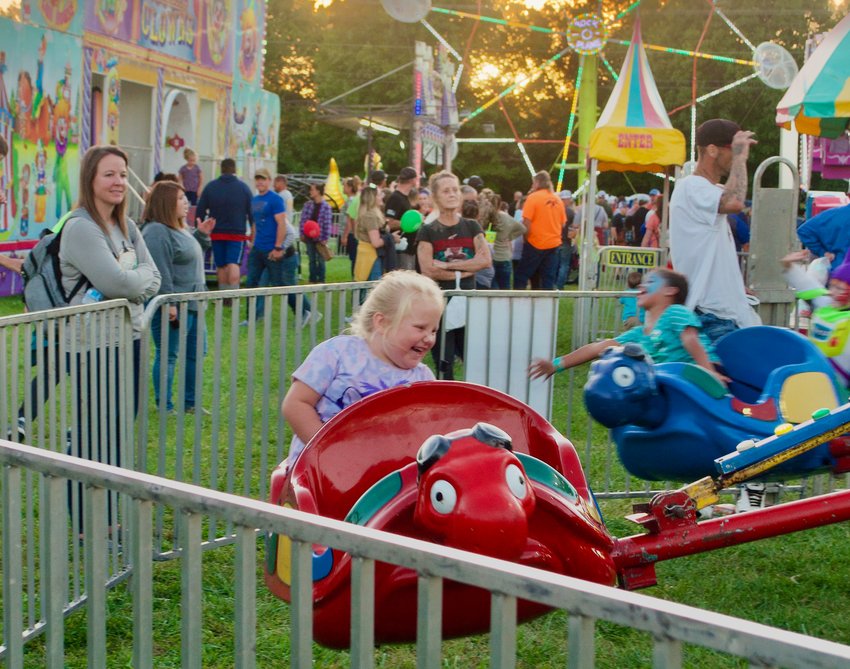 A young girl enjoys the carnival at the Black Walnut Festival in Stockton in 2021. The renowned festival is set to return again for its 62nd year this month.