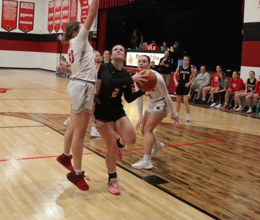 Ellie Flora scores 2 of her 12 points last week against Miller as she led the Lady Tigers in scoring in the road loss against the Lady Cardinals