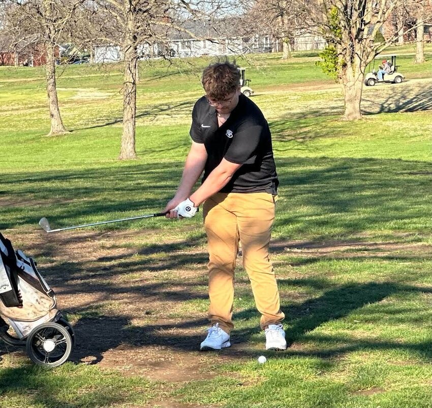 Parker Phelan is in mid-swing during golf competition last week at Stockton Country Club. The Tigers finished second in the outing