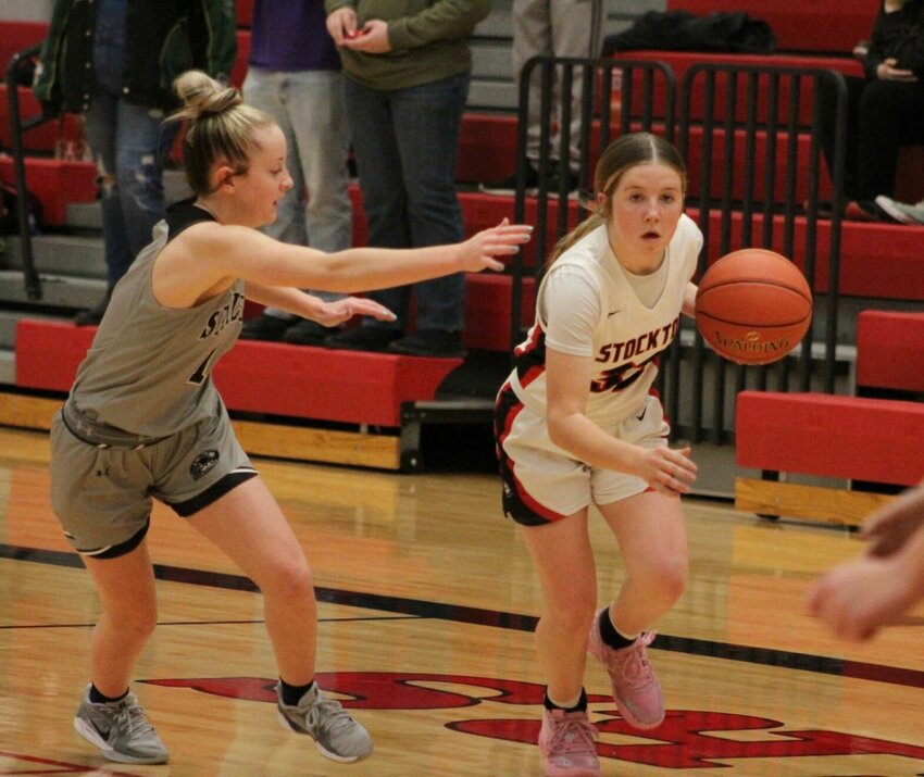 Taly Bock takes the ball to the hole against Skyline last Thursday for 2 of her 4 points on the night.