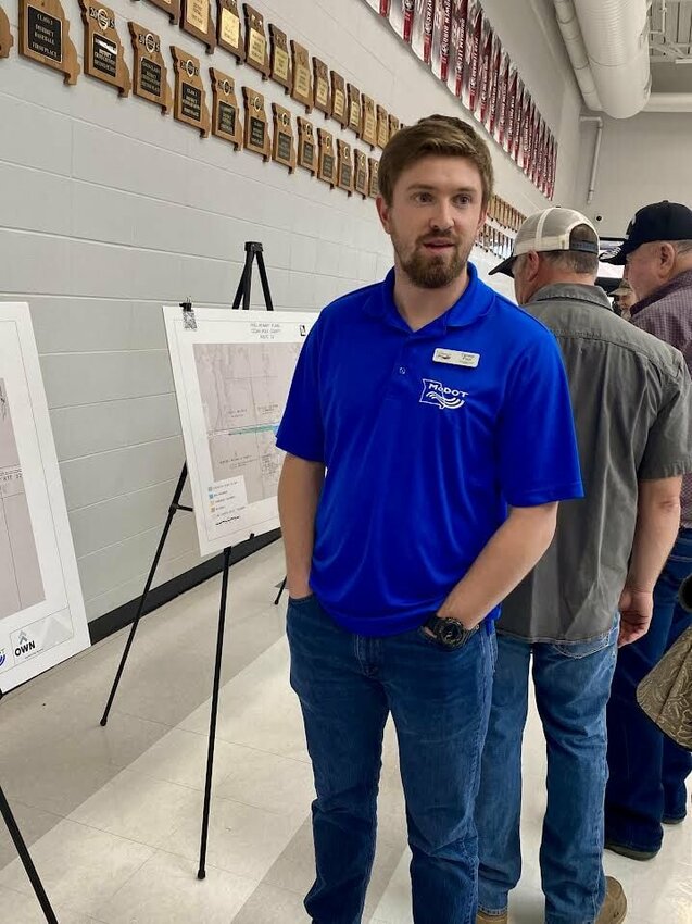 MoDot representative Tanner Poor meets with the public to answer questions and explain plans for the MoDot 32 Corridor Project. MoDot held a public meeting last week at Stockton High School to unveil the project.